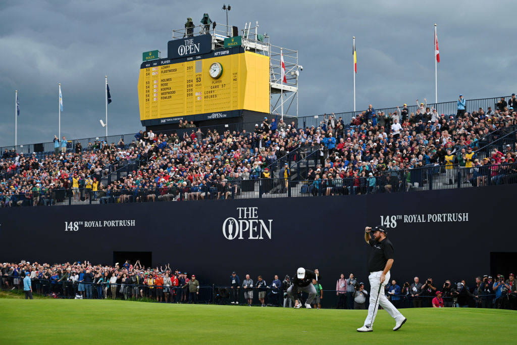 Shane Lowry salutes a cheering crowd